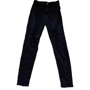 Slightly ripped black skinny jeans. Barely worn and in great condition!
